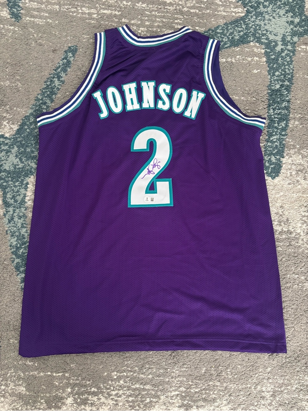 Larry Johnson signed Charlotte Hornets jersey with authenticity